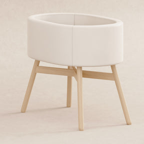M26834GYLB,Babyletto,babyletto x GATHRE Capsule Bassinet in Ivory